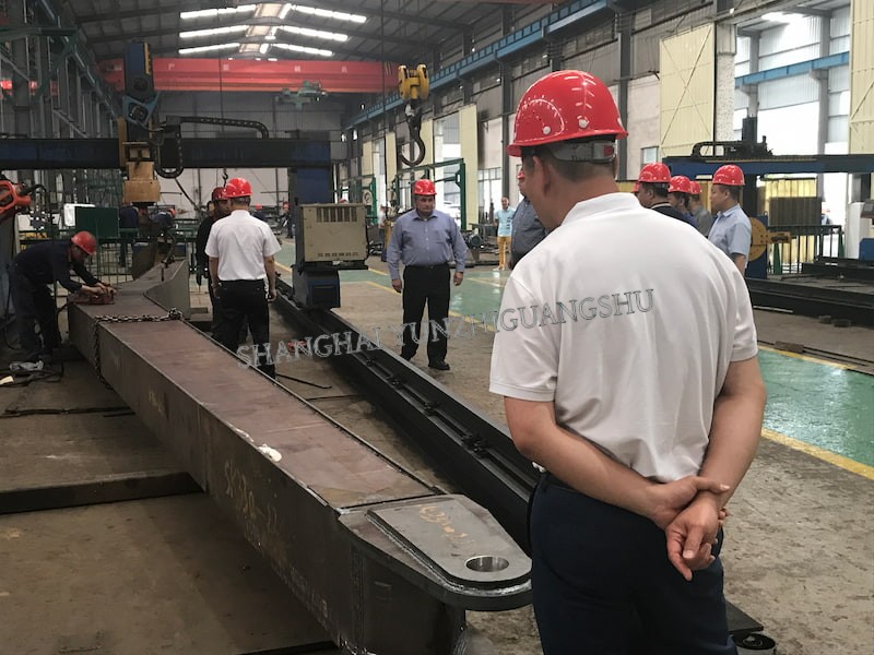 our clients checking the long reach arm & boom production